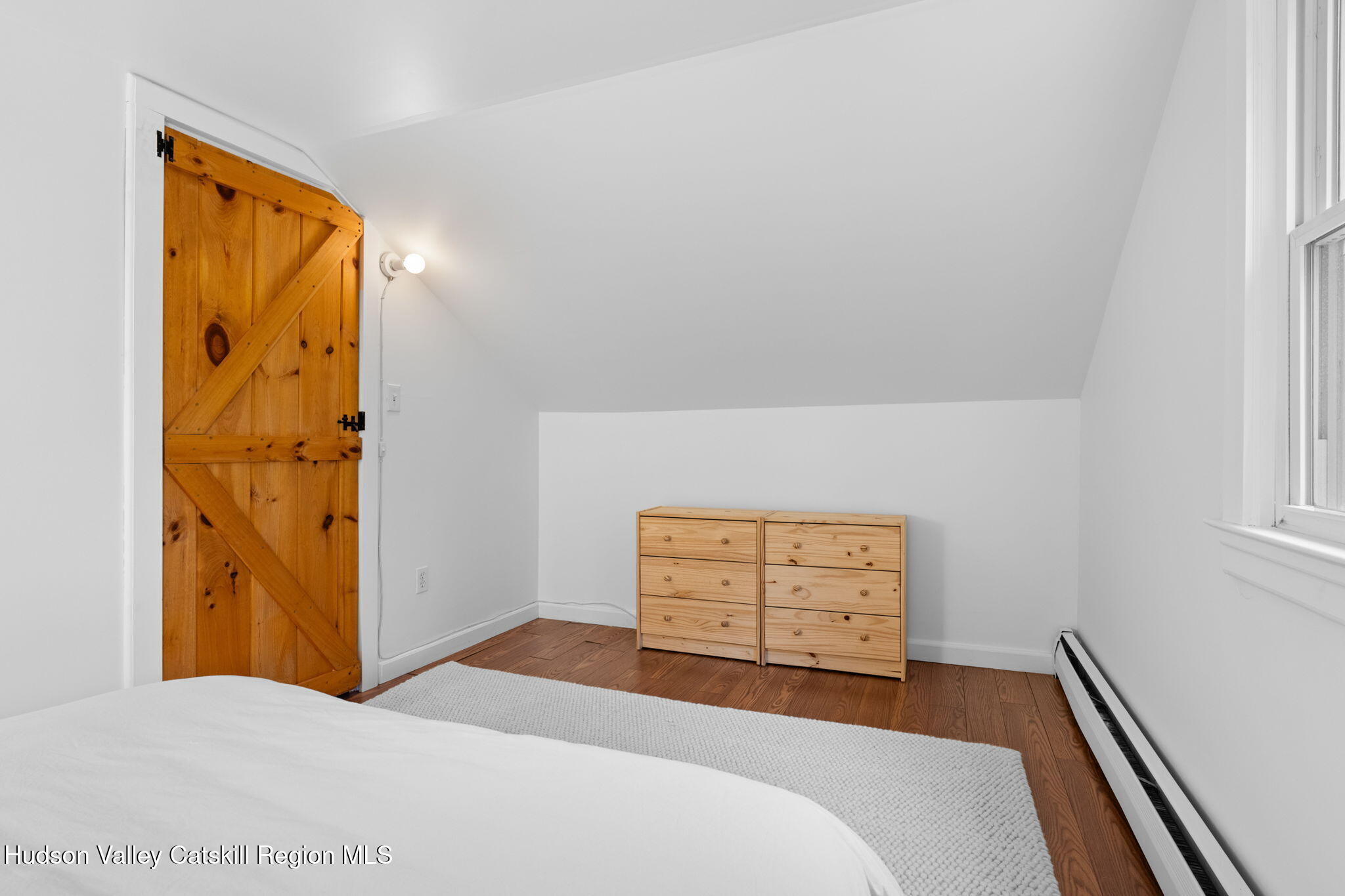 284 Sheldon Hill Road Olivebridge, NY 12461 - Photo 20 of 29 a bedroom with a bed and a dresser