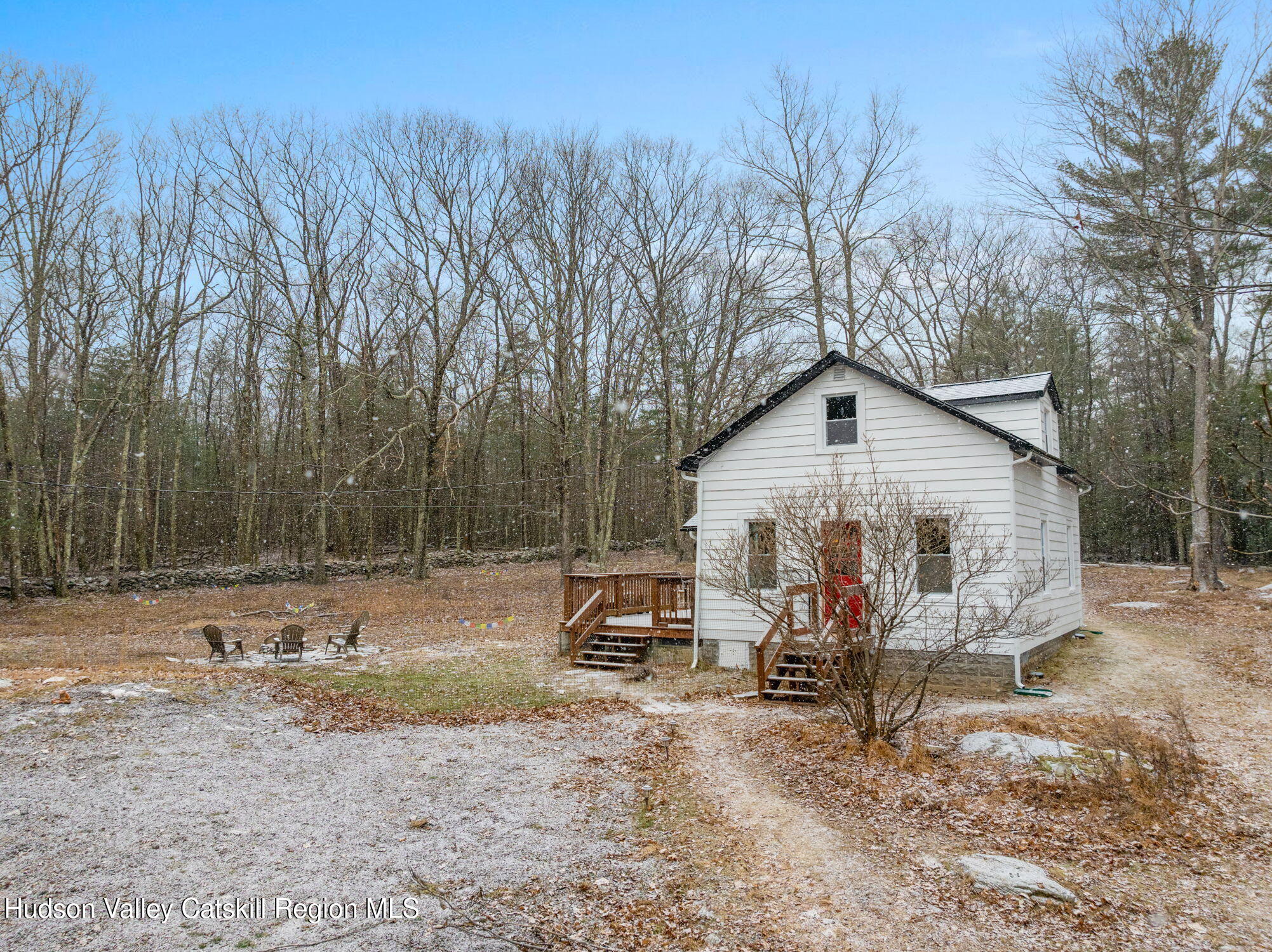 284 Sheldon Hill Road Olivebridge, NY 12461 - Photo 23 of 29 a view of a small house with a yard covered in forest
