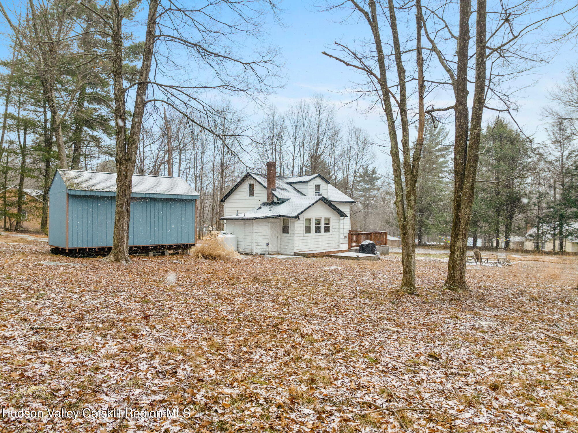 284 Sheldon Hill Road Olivebridge, NY 12461 - Photo 27 of 29 a view of a house with a yard covered in snow