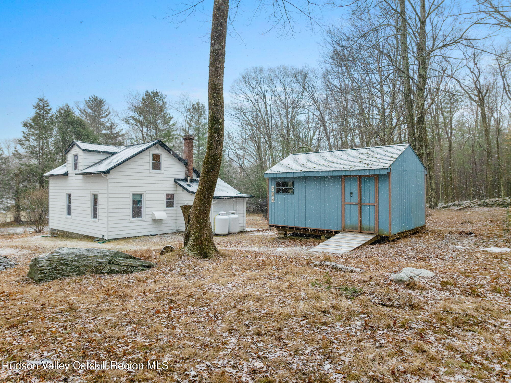 284 Sheldon Hill Road Olivebridge, NY 12461 - Photo 3 of 29 a house with trees in the background