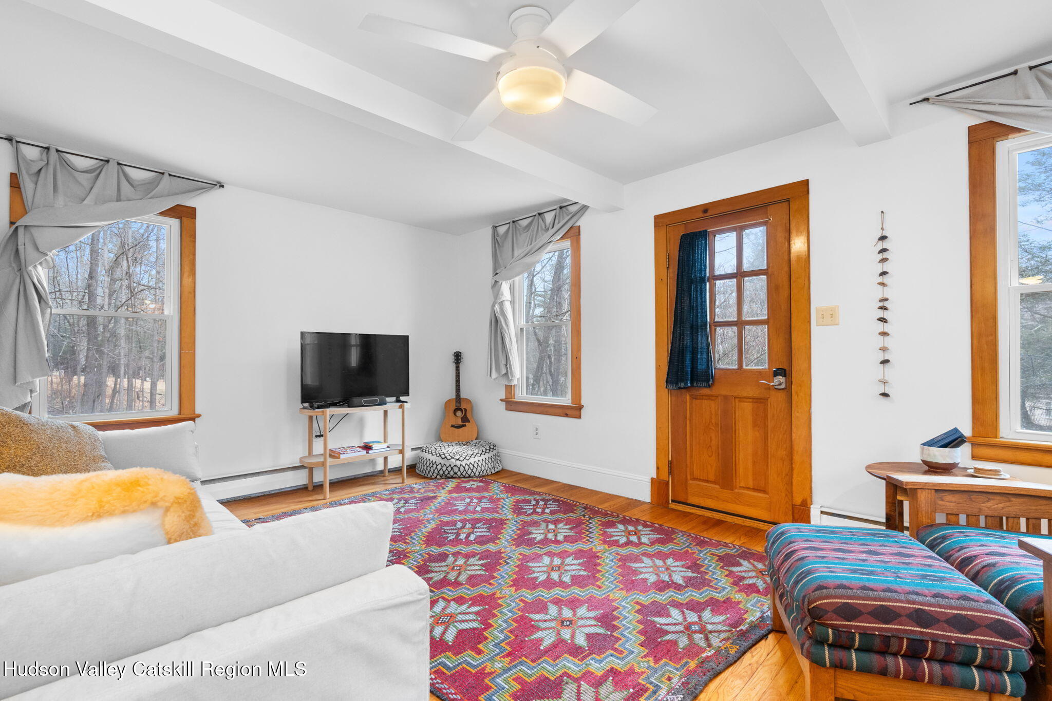 284 Sheldon Hill Road Olivebridge, NY 12461 - Photo 7 of 29 a living room with furniture and a flat screen tv