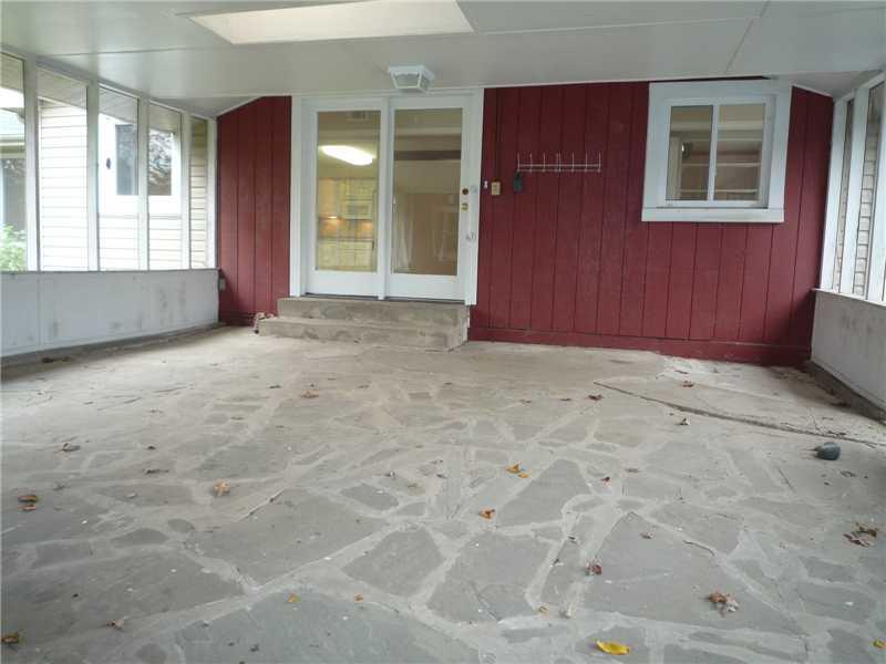 3743 Windover Road Murrysville, PA 15668 - Photo 18 of 25 Other. Breezeway between garage and kitchen - notice the rustic stone floor and huge french doors