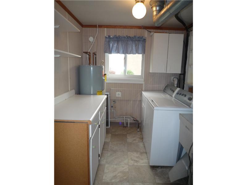 3743 Windover Road Murrysville, PA 15668 - Photo 8 of 25 Other. Laundry is conviently located next to the kitchen with folding table and utility sink