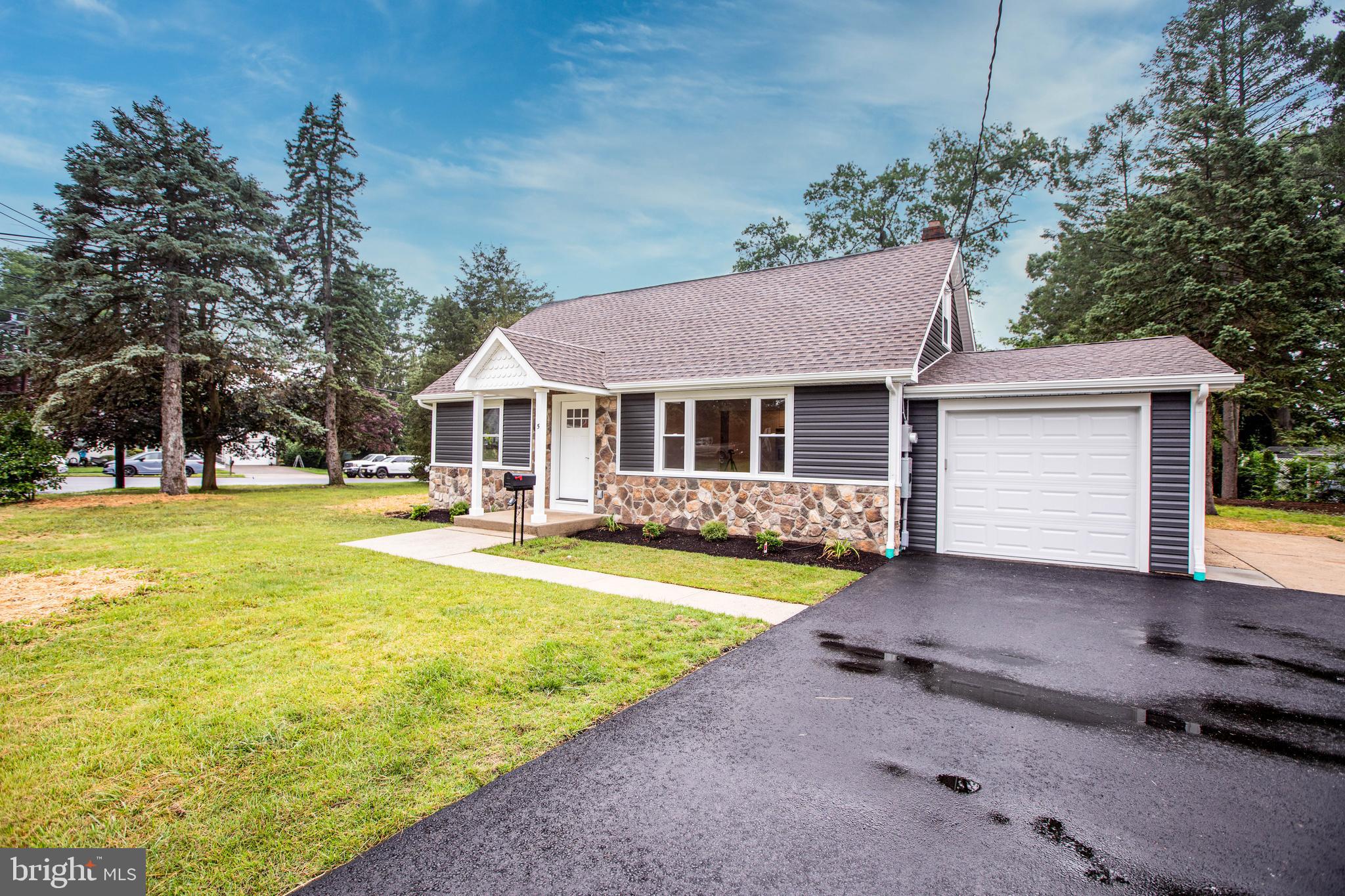 5 Cold Spring Road Hamilton, NJ 08619 - Photo 2 of 33 a front view of a house with swimming pool having outdoor seating