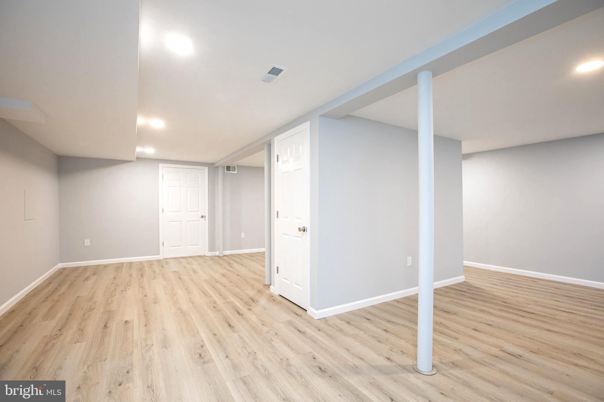 5 Cold Spring Road Hamilton, NJ 08619 - Photo 23 of 33 a view of an empty room with wooden floor