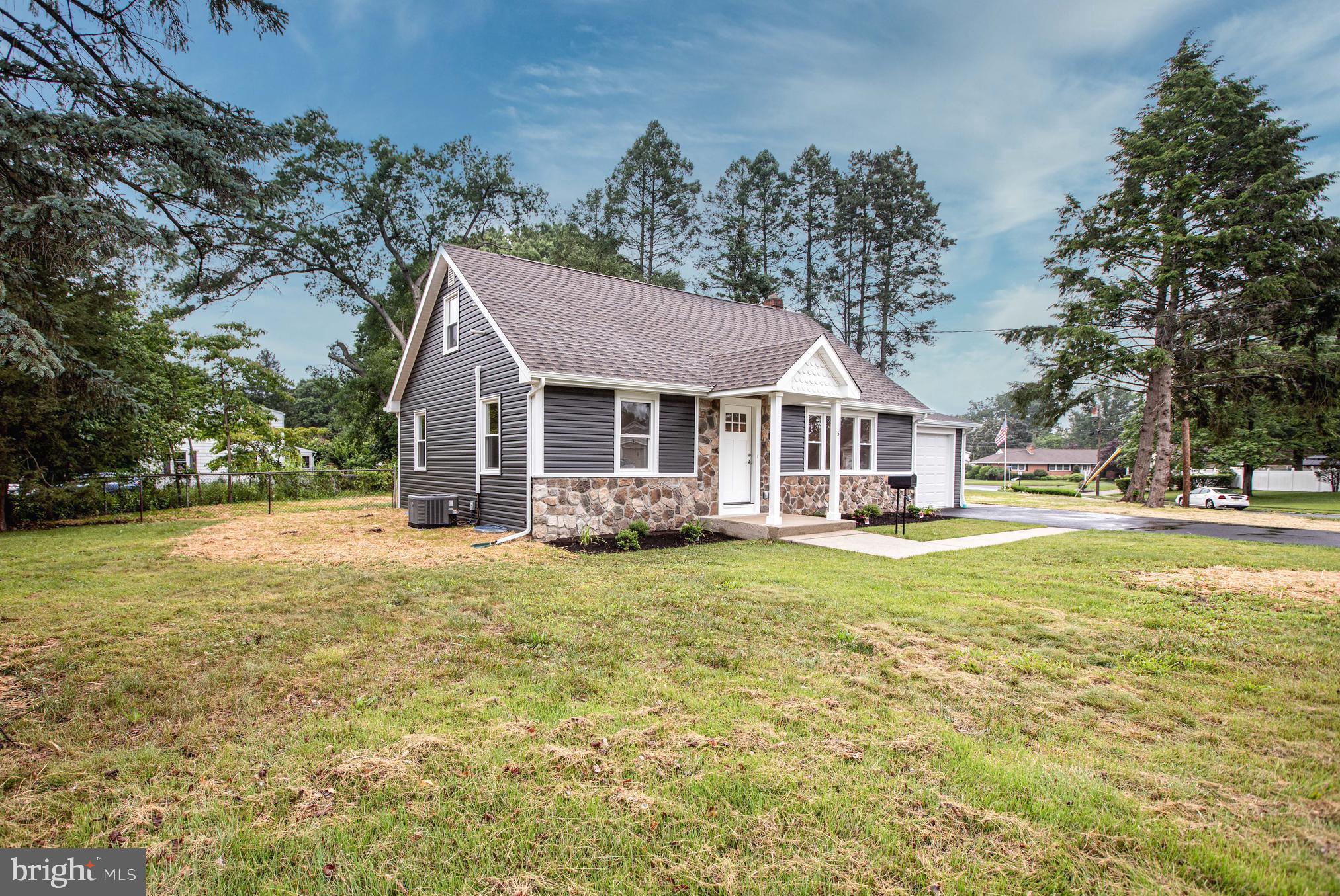 5 Cold Spring Road Hamilton, NJ 08619 - Photo 4 of 33 a front view of a house with swimming pool and porch