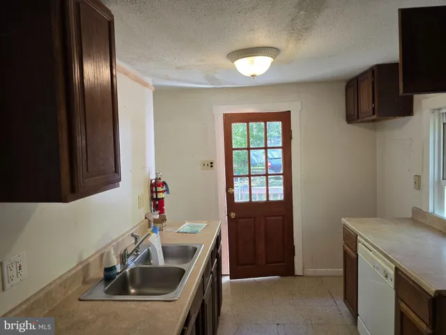 an empty room with closet area