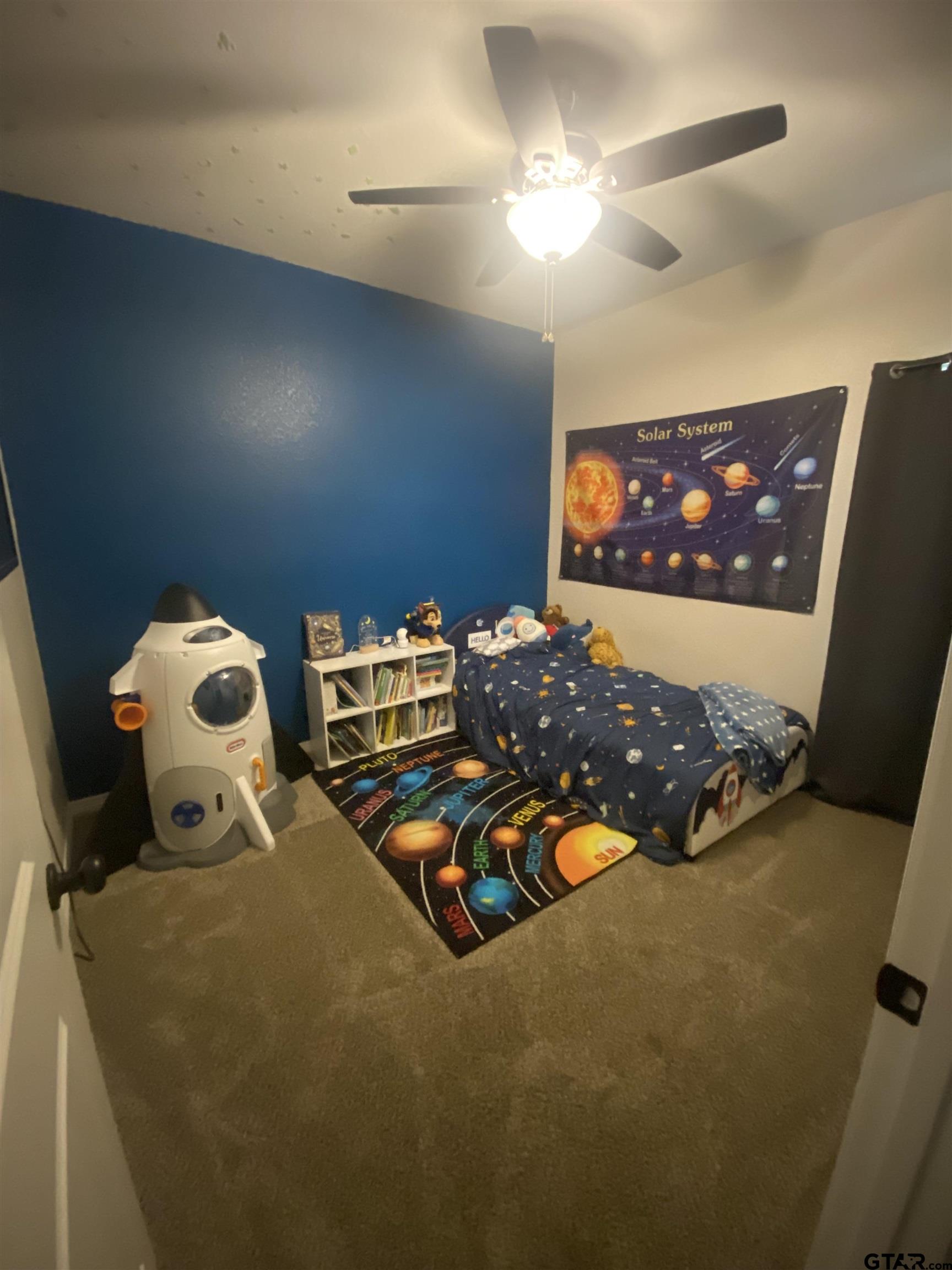 520 Cornerstone Road Lindale, TX 75771 - Photo 15 of 16 a bedroom with two beds and a flat screen tv