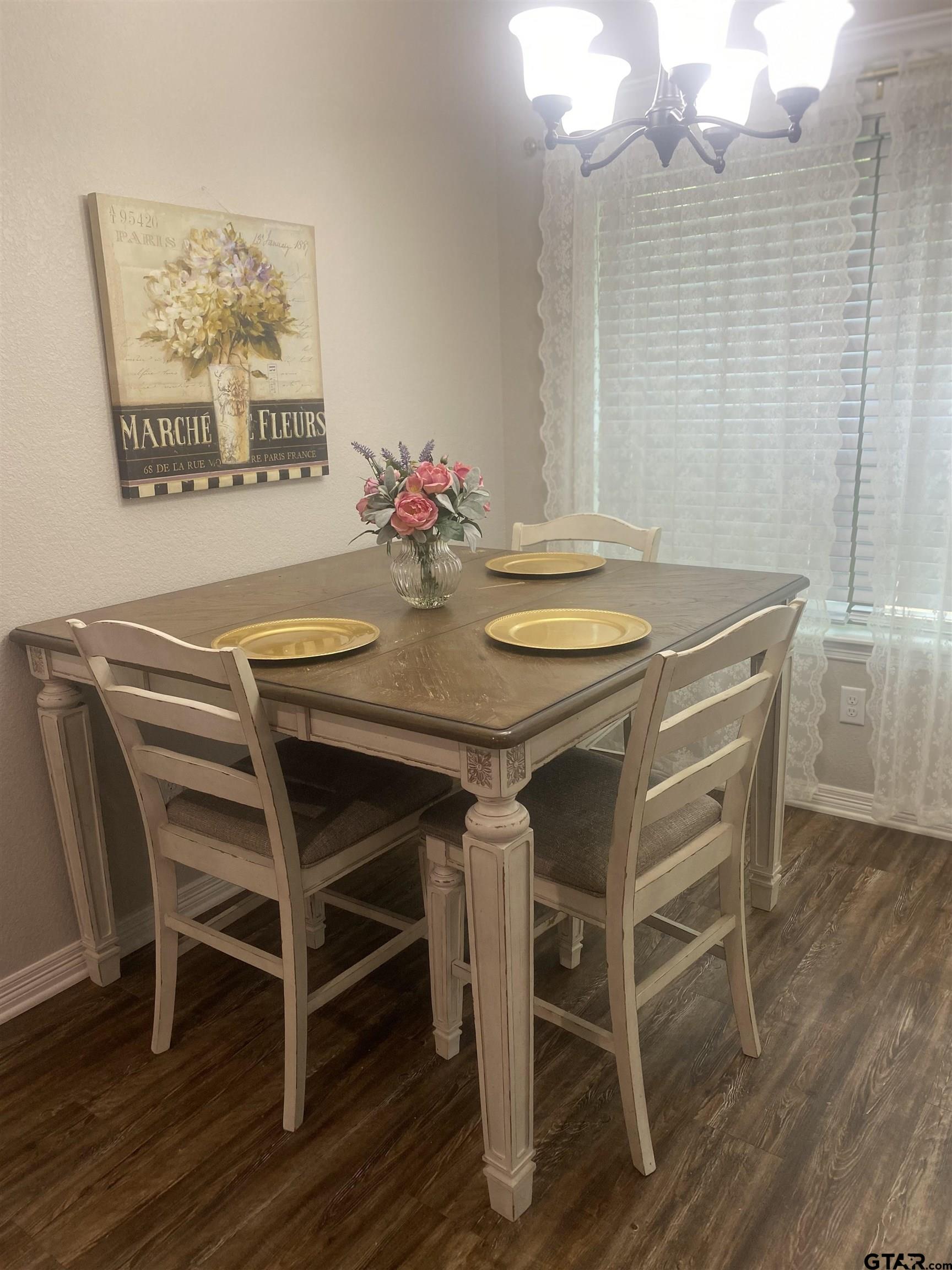 520 Cornerstone Road Lindale, TX 75771 - Photo 2 of 16 a view of a dining room with furniture and wooden floor