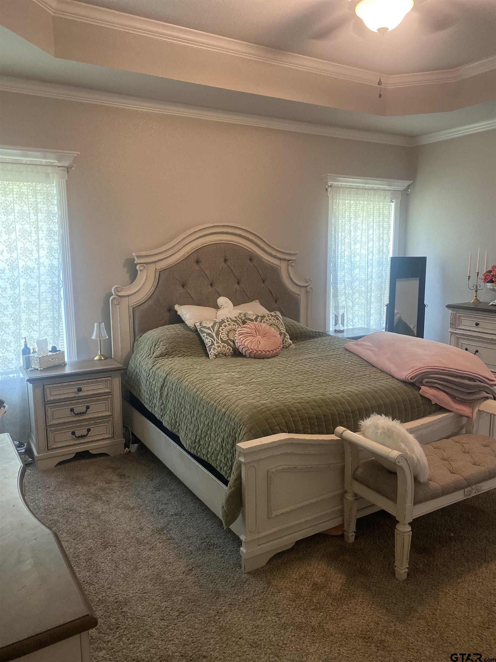 520 Cornerstone Road Lindale, TX 75771 - Photo 9 of 16 a bedroom with a bed and a table