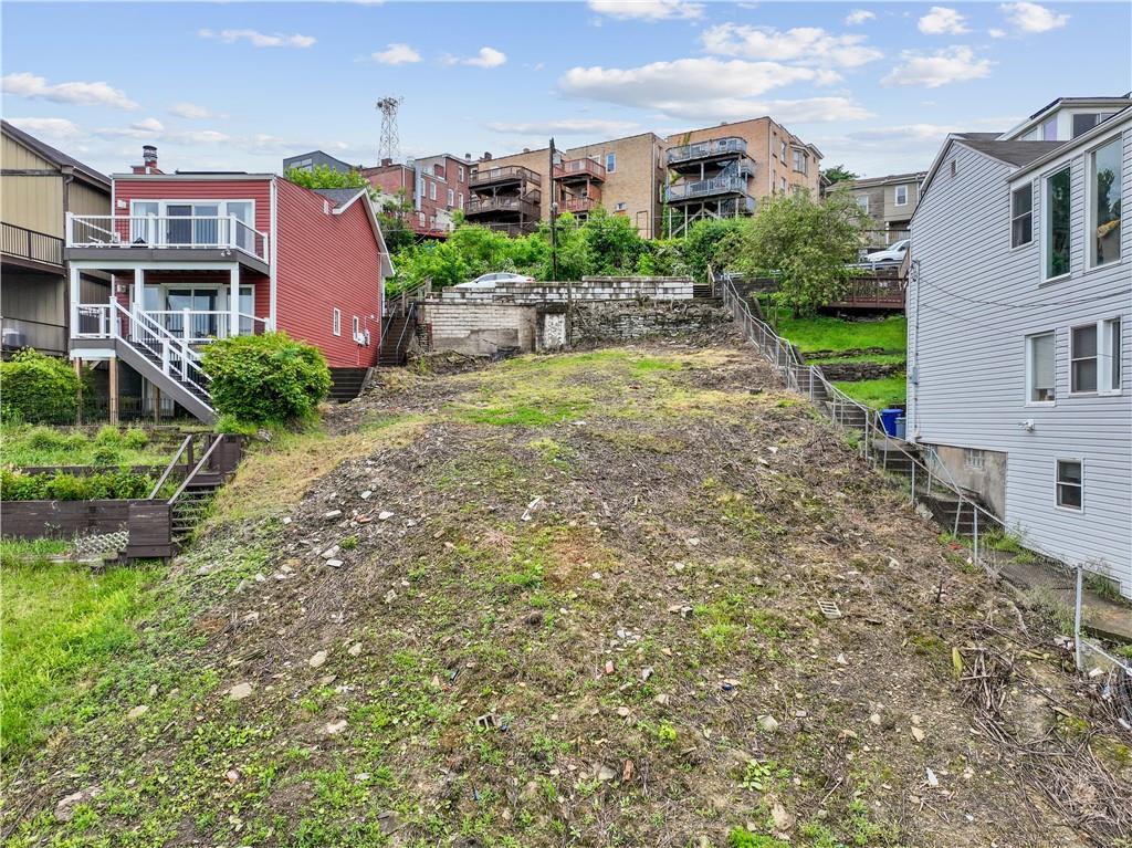 446 William Street Mount Washington, PA 15211 - Photo 4 of 28 a backyard of a house with plants and outdoor seating