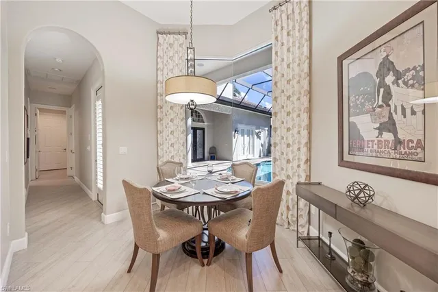 a bedroom with bed and window