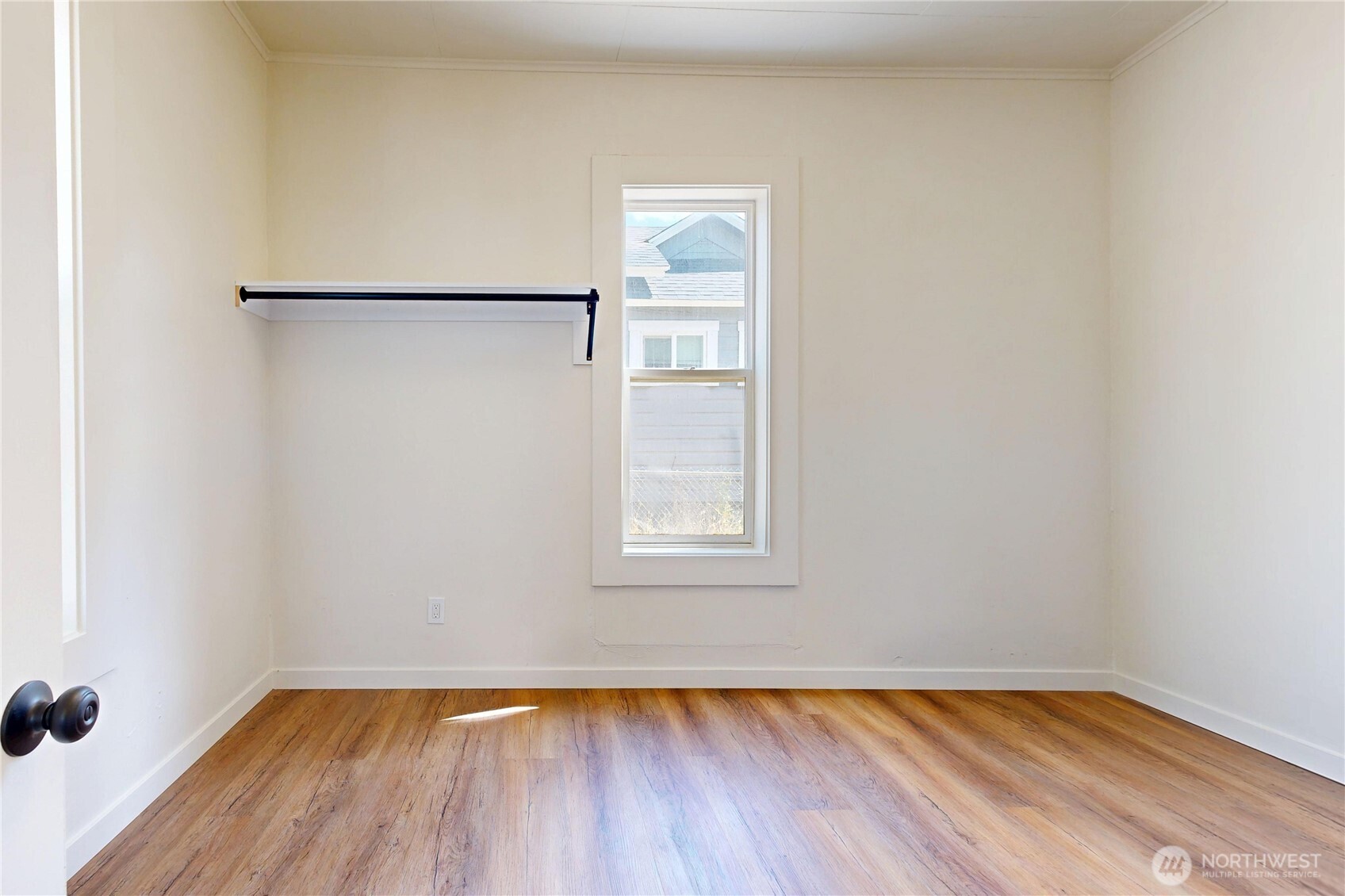 611 Southwest 3rd Street Pendleton, OR 97801 - Photo 11 of 21 a view of a small space with wooden floor and a window