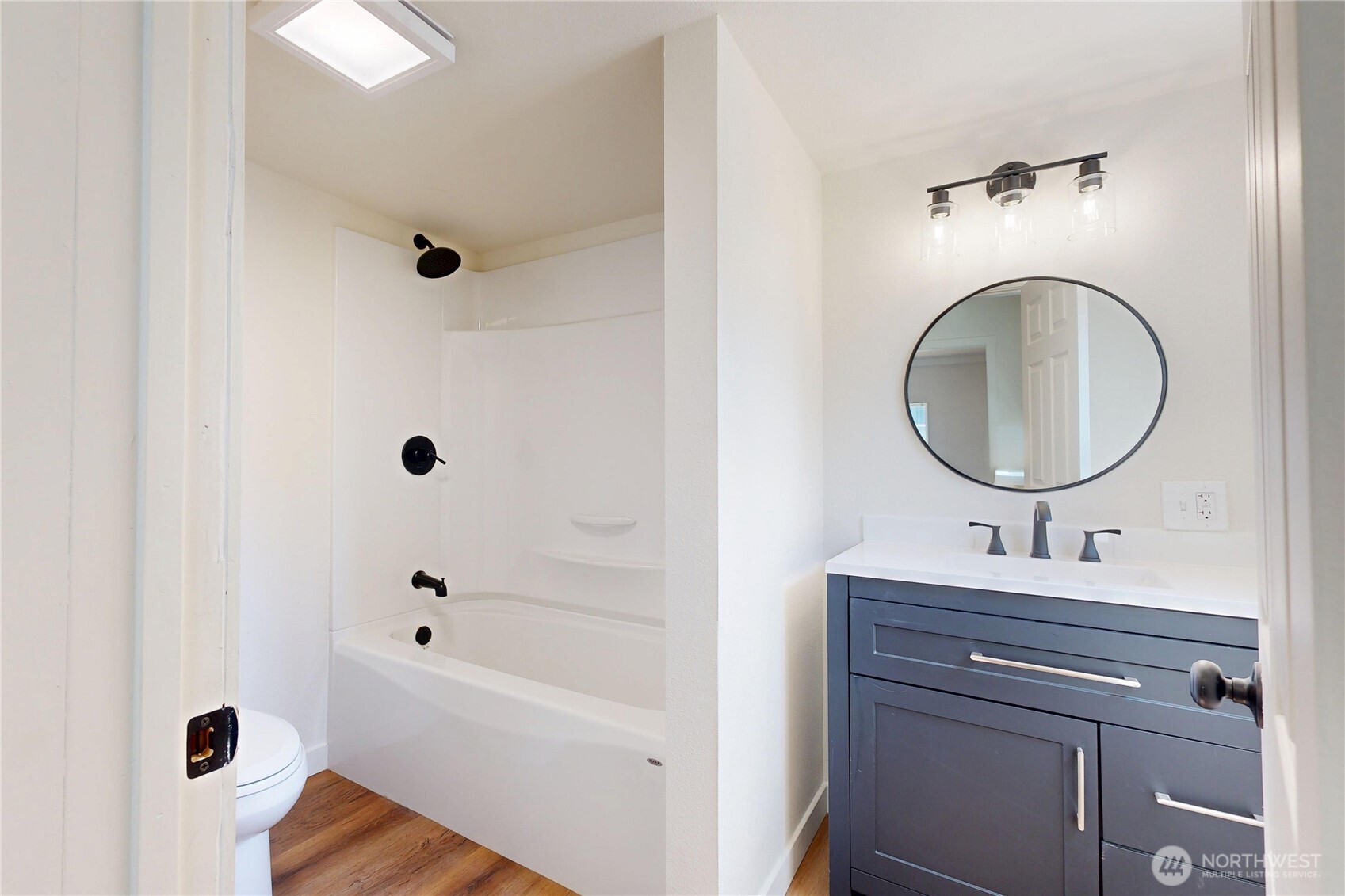 611 Southwest 3rd Street Pendleton, OR 97801 - Photo 16 of 21 a bathroom with a sink and a mirror