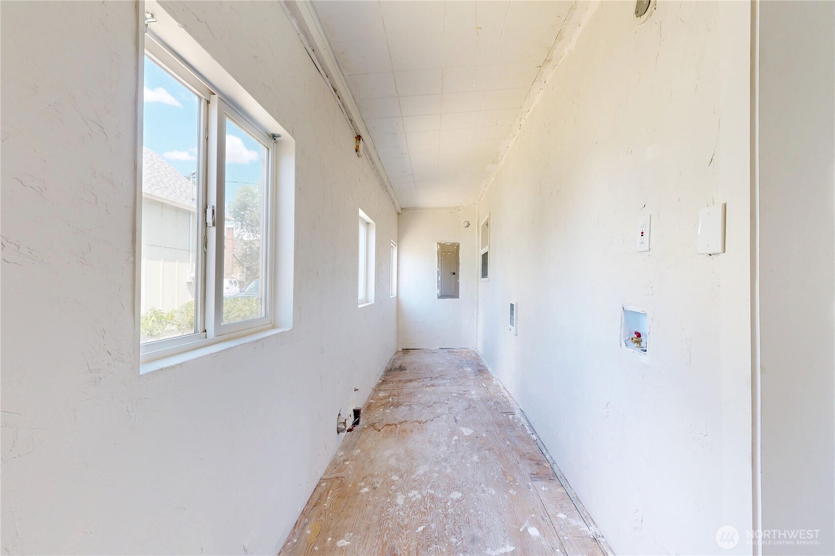611 Southwest 3rd Street Pendleton, OR 97801 - Photo 18 of 21 a view of a hallway with windows
