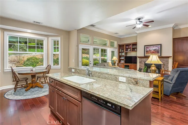 a dining table with chairs and window