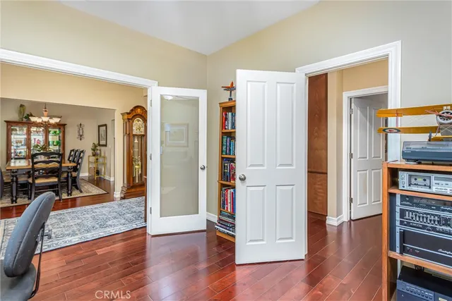 a view of a livingroom with furniture and wooden floor