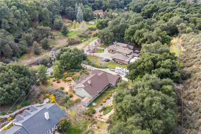 an aerial view of house with yard