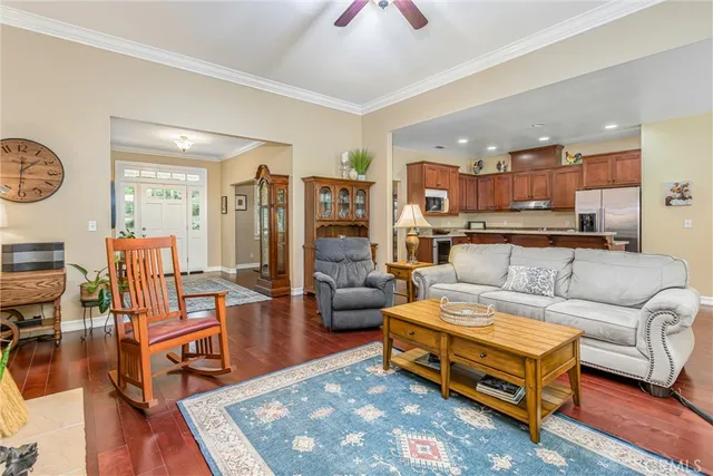 a living room with furniture and a rug