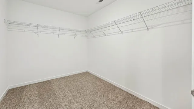 a view of a room with racks on the wall