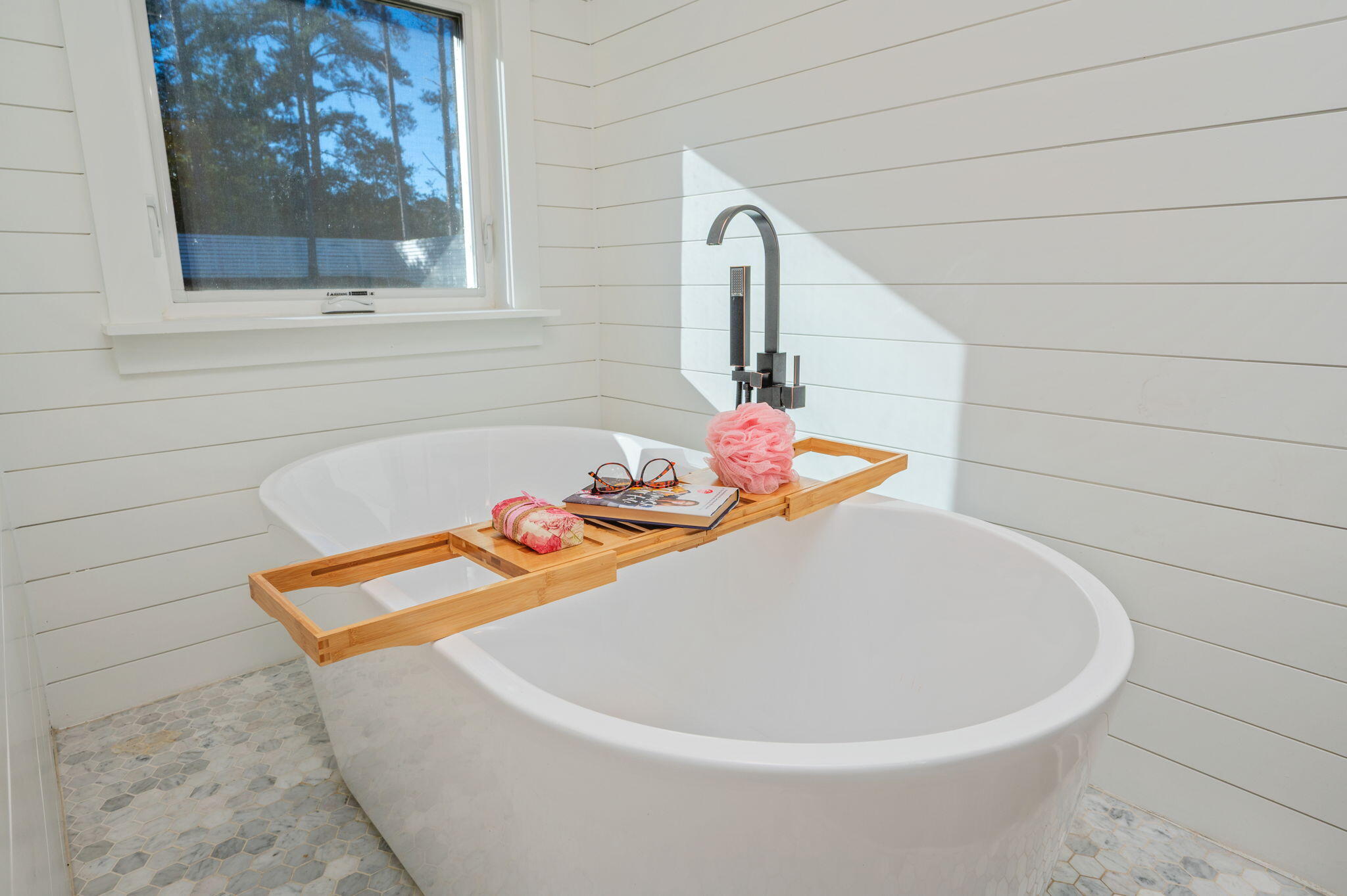 3120 Pinot Way Crestview, FL 32536 - Photo 14 of 37 a white bath tub sitting next to a white sink and vanity
