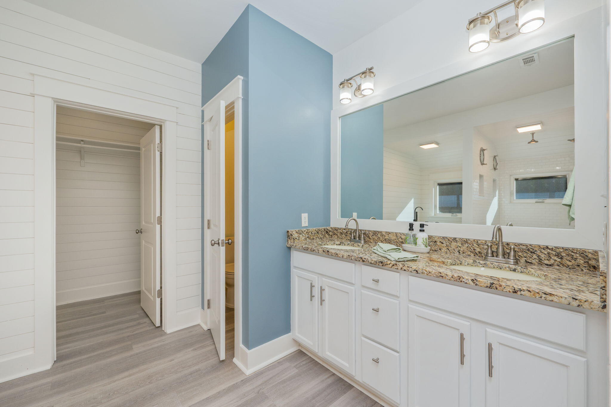 3120 Pinot Way Crestview, FL 32536 - Photo 15 of 37 a bathroom with a granite countertop sink and a mirror