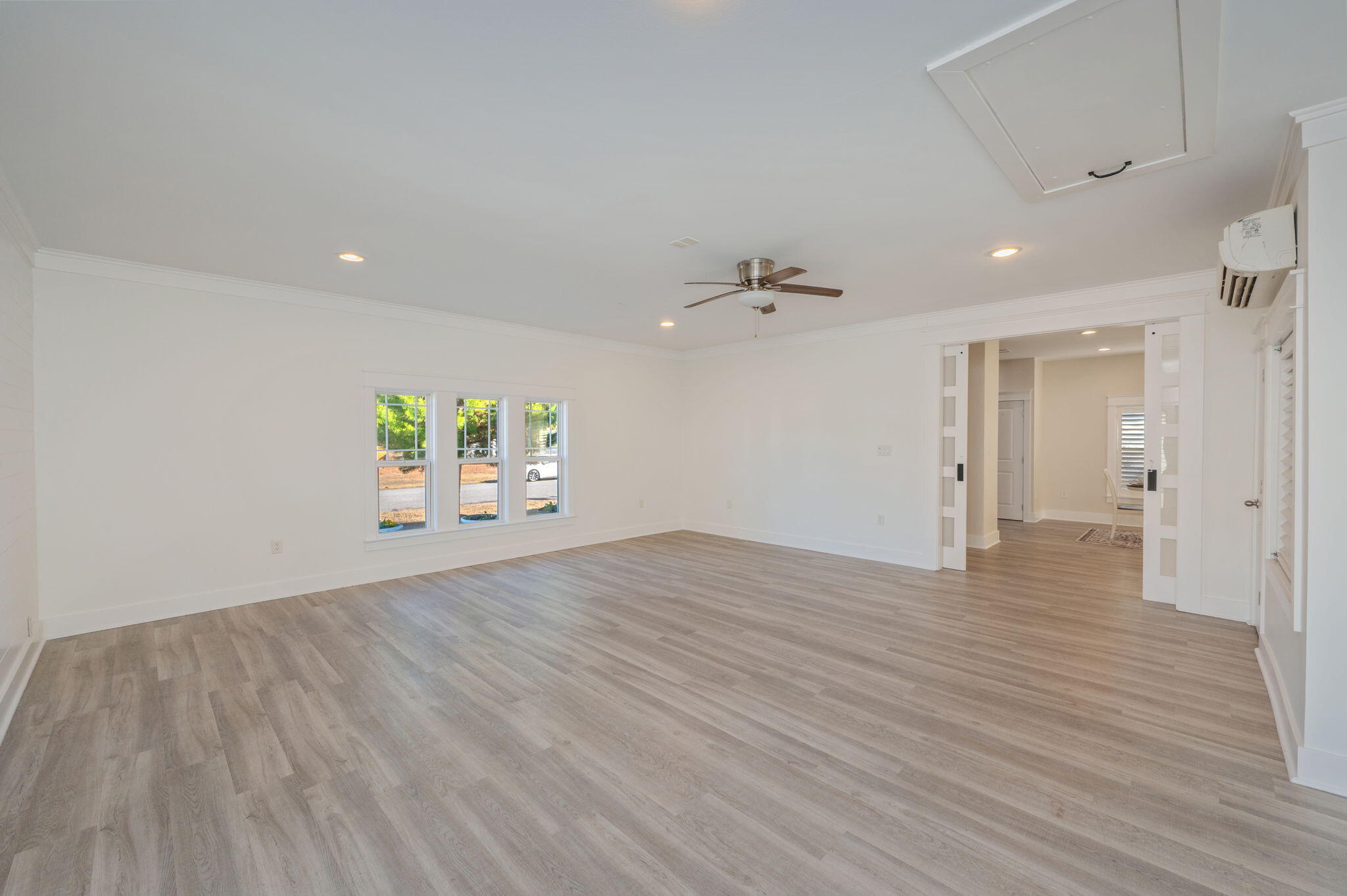 3120 Pinot Way Crestview, FL 32536 - Photo 24 of 37 wooden floor in an empty room with a window