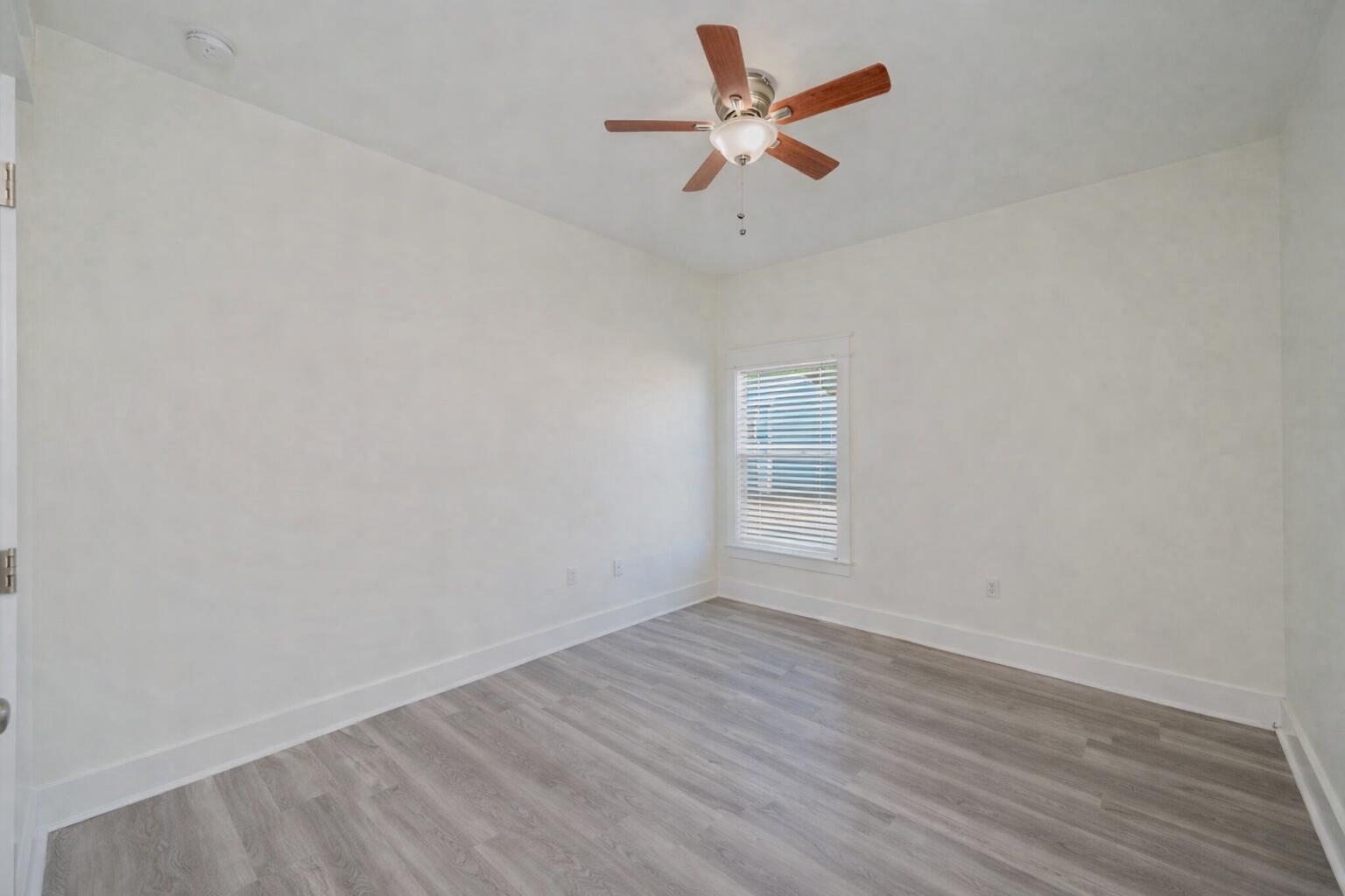 3120 Pinot Way Crestview, FL 32536 - Photo 27 of 37 an empty room with a window and ceiling fan