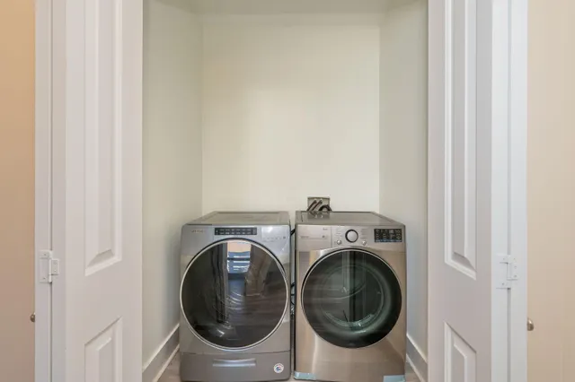 a utility room with dryer and washer