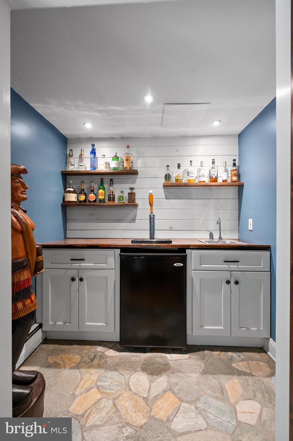 480 Highview Drive Wayne, PA 19087 - Photo 12 of 67 Remodeled bar behind sliding barn doors