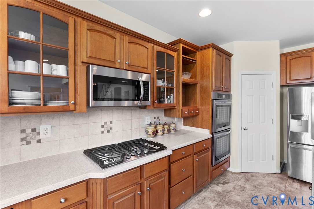 753 Blossom Tree Road Culpeper, VA 22701 - Photo 30 of 68 Kitchen featuring wood cabinetry, stainless steel