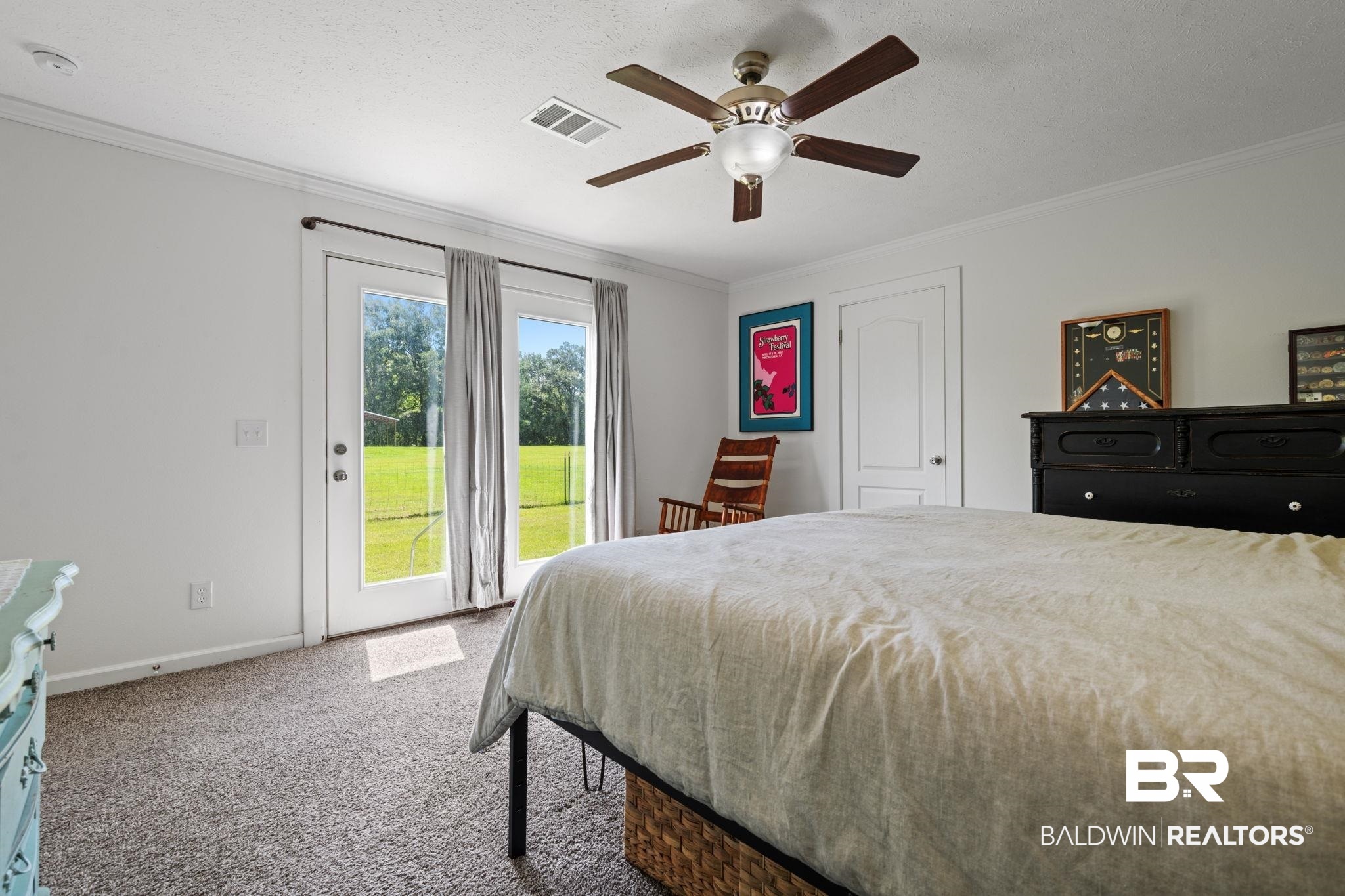 10703 South Ridge Drive Semmes, AL 36575 - Photo 21 of 37 Carpeted bedroom with access to exterior, ornamental molding, and ceiling fan