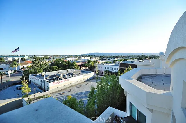 a view of a city from terrace with seating space