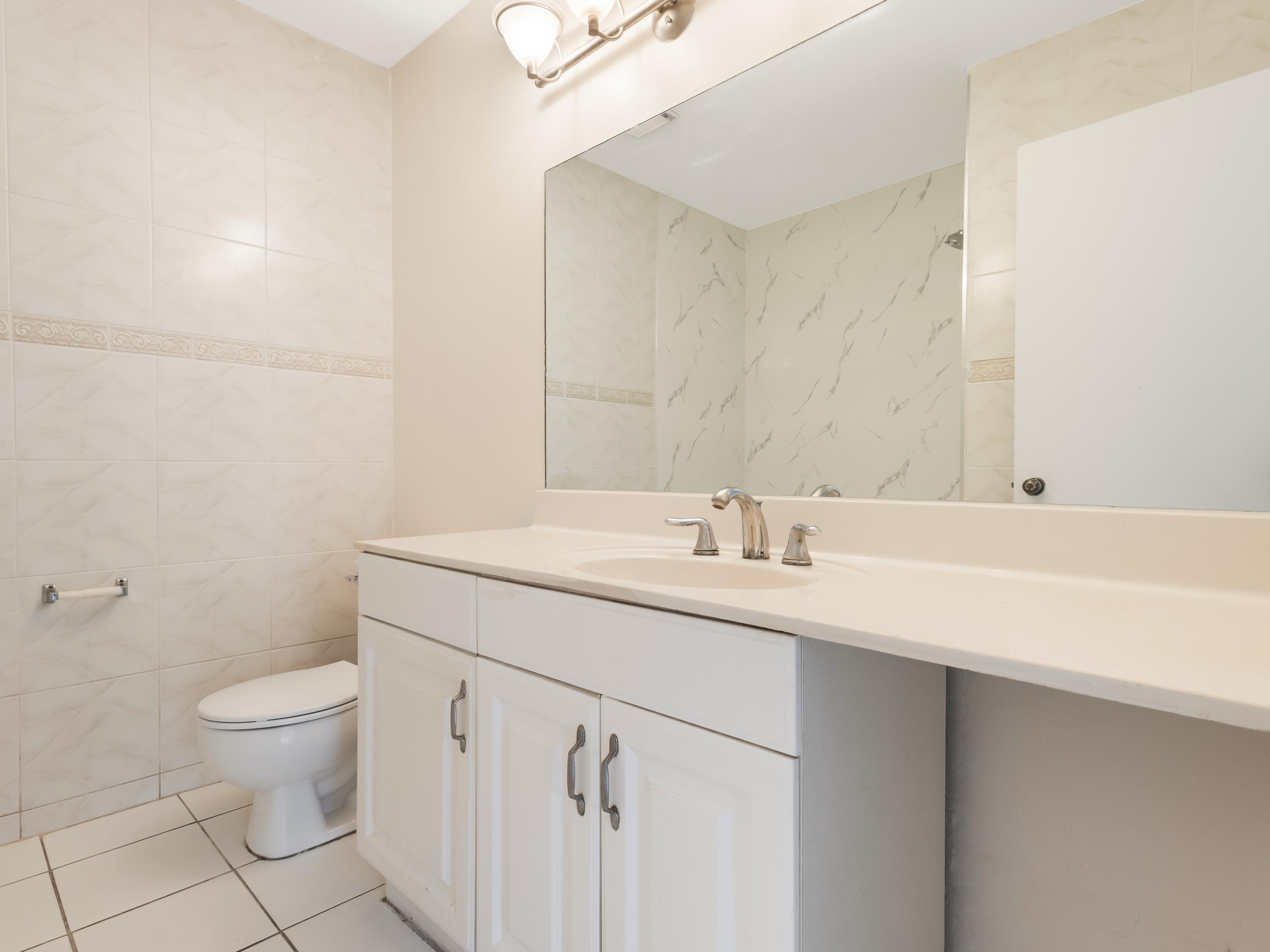 4806 Cherry Road West Palm Beach, FL 33417 - Photo 21 of 28 Guest Bathroom