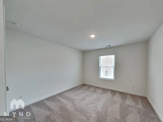 a bathroom with a sink toilet vanity and shower