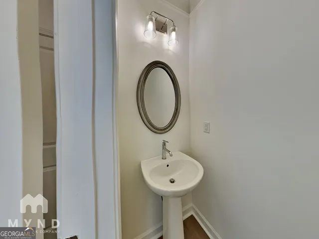 a view of house with backyard