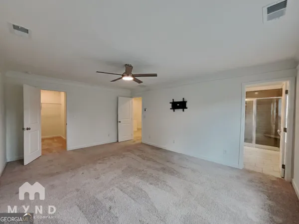 a bathroom with a shower and a bathtub