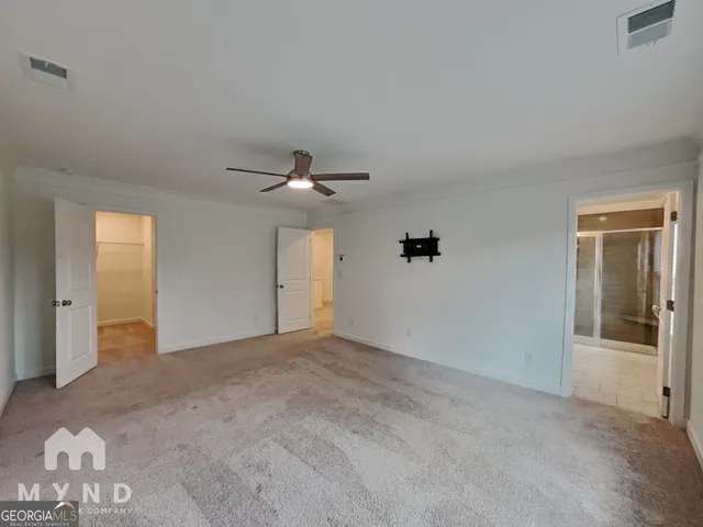 a bathroom with a shower and a bathtub