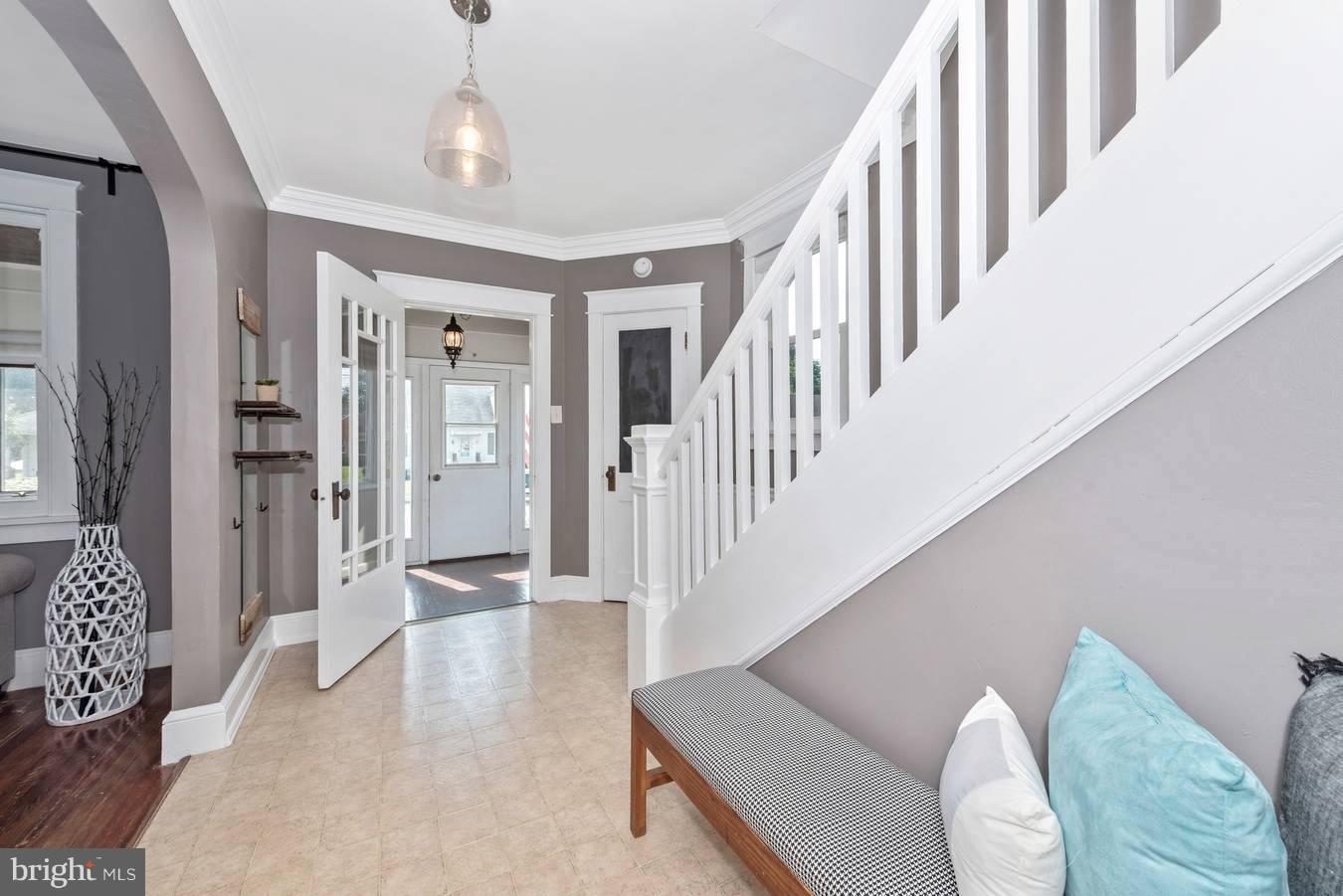 317 Avon Road Hagerstown, MD 21740 - Photo 20 of 30 a view of a livingroom with wooden floor and stairs