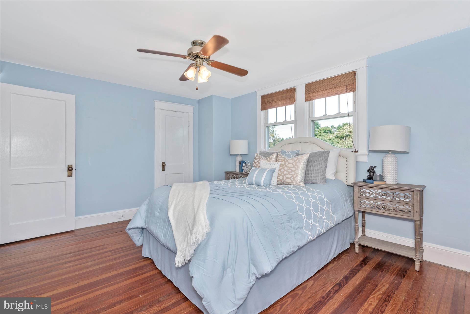 317 Avon Road Hagerstown, MD 21740 - Photo 23 of 30 a spacious bedroom with a bed and wooden floor
