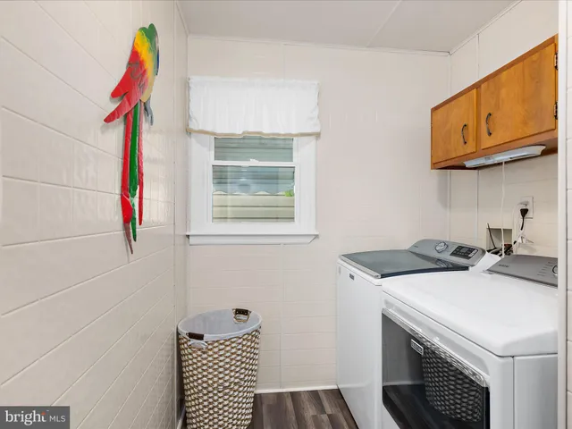 a bathroom with a tub and a shower