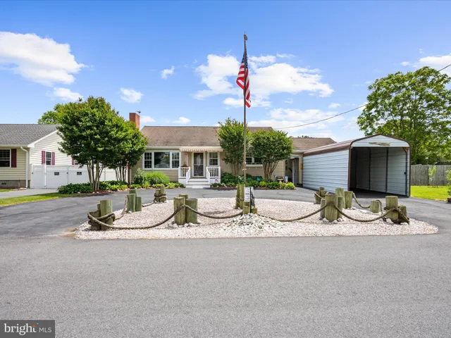 a view of house with outdoor space and entertaining space