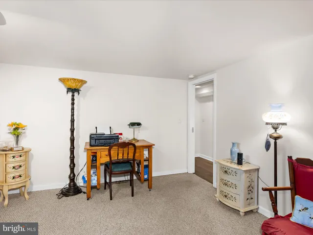 a view of a chairs and table in backyard