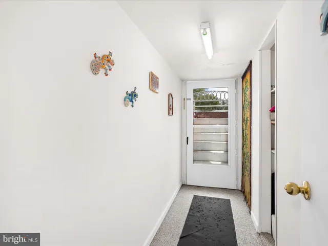 a view of a swimming pool and lounge chairs
