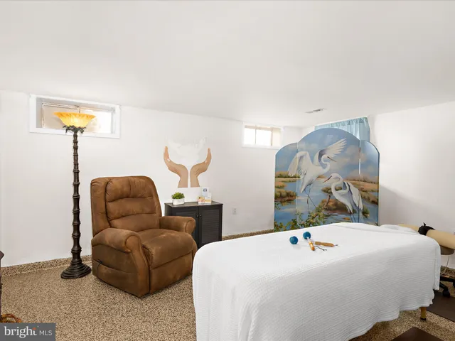 a view of house with swimming pool yard and outdoor seating