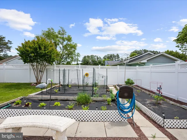 a view of a patio with swimming pool