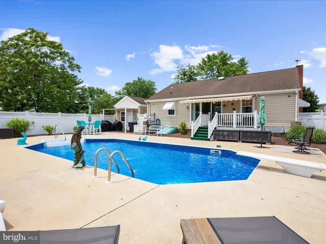 a view of outdoor space yard and swimming pool
