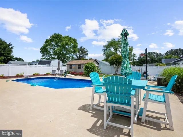 a terrace view with sitting space and garden