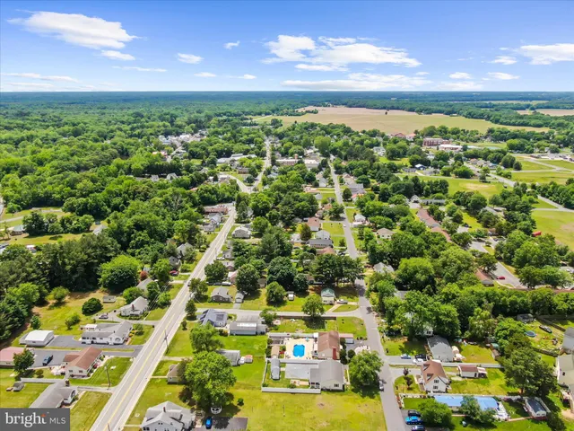 an aerial view of a house with large space