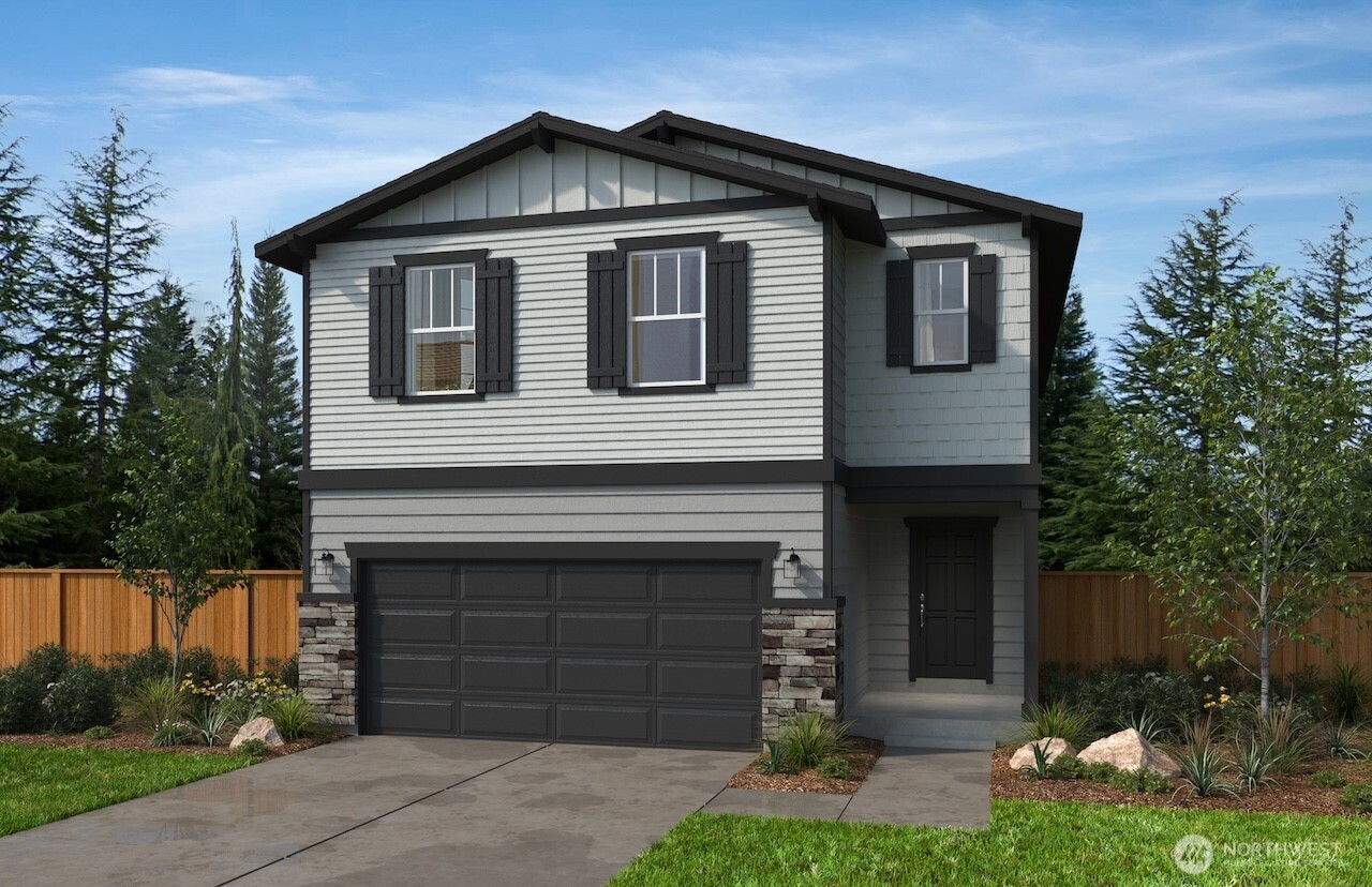 24232 13 Avenue Southeast, Unit CR05 Bothell, WA 98021 - Photo 1 of 1 a front view of a house with a yard and garage